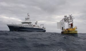 AGS 61 Cabo de Hornos next to the WHOI Stratus Ocean Reference station buoy during a cruise to recover and redeploy the Stratus ORS mooring